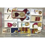 A collection of enamel and gilt metal Masonic charity jewels, including a 1945 plastic jewel.