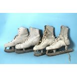 Two pairs of lady's white leather ice skates, eight various rackets, a lacrosse stick, tennis balls,