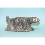 An Inuit carved stone bear, signed on base Moses Aliqu c1871 C No.5 - 21954, 15cm long, 6cm high.