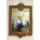 A modern stained wood gilt-metal-mounted wall mirror in the French taste, mounted with porcelain
