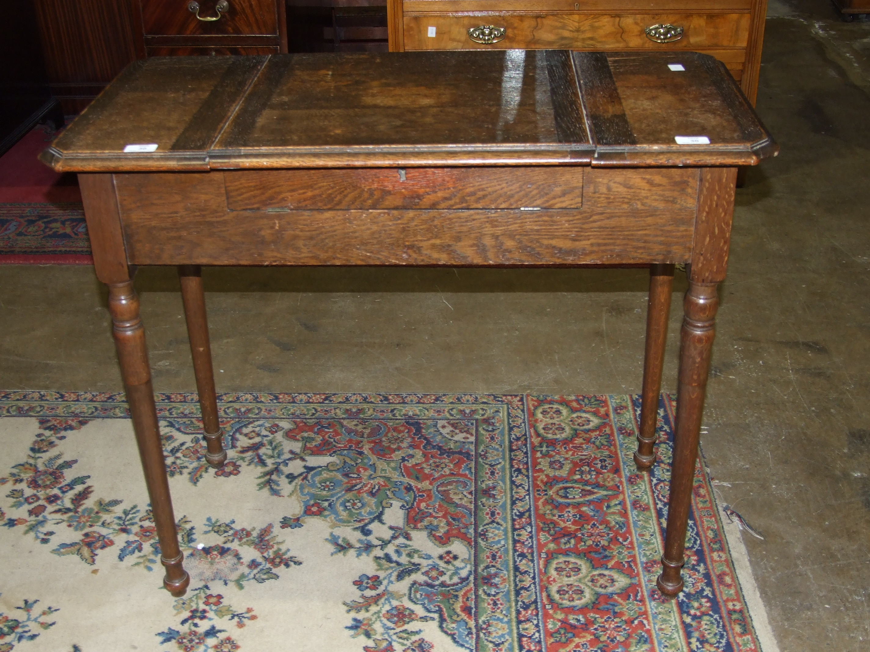 'The Britisher Desk', an early-20th century folding writing desk fitted with stationery - Image 3 of 3