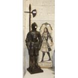 A bronzed metal companion set in the form of a knight in a suit of armour, 90cm high, a copper