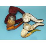 A large meerschaum pipe, a bearded gentleman with white metal hat, 18.5cm long, cased and another