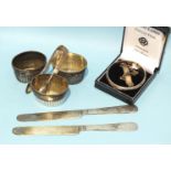Three silver half-gadrooned salts, London 1882, two foreign silver butter knives and other items.