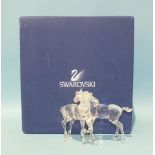 A Swarovski Crystal group of two foals, boxed.