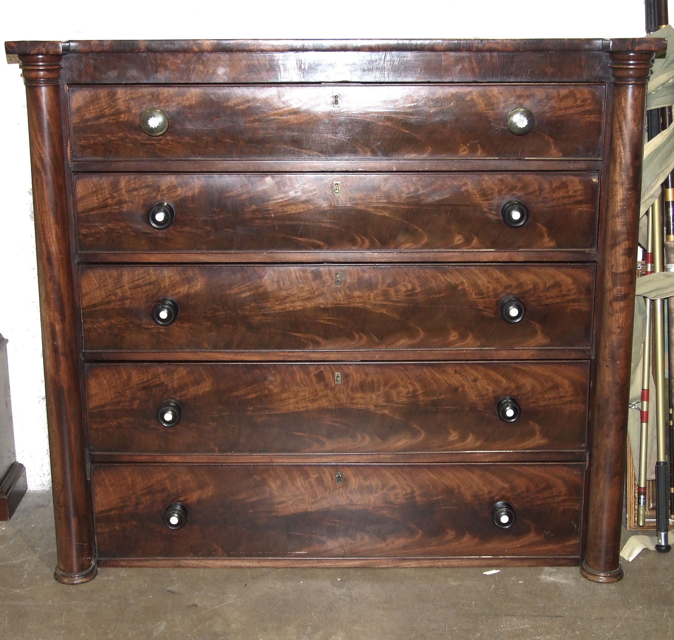 A good-quality mahogany chest of five long cockbeaded drawers flanked by columns, 120cm wide,