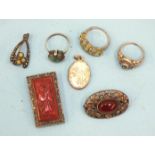 A Chinese cinnabar lacquer clip with filigree mount, a silver brooch set cornelian and other items.