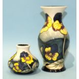 A Moorcroft 'Pansy Parade' decorated baluster shape vase, impressed factory mark and ©2006 to