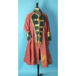 A canvas 18th century-style frock coat, a fur coat and other dressing-up items.