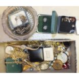 A silver charm bracelet, costume jewellery and miscellaneous items.