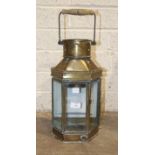 A brass masthead light by Alderson and Gyde Ltd, 1942, 52cm high, (burner lacking).