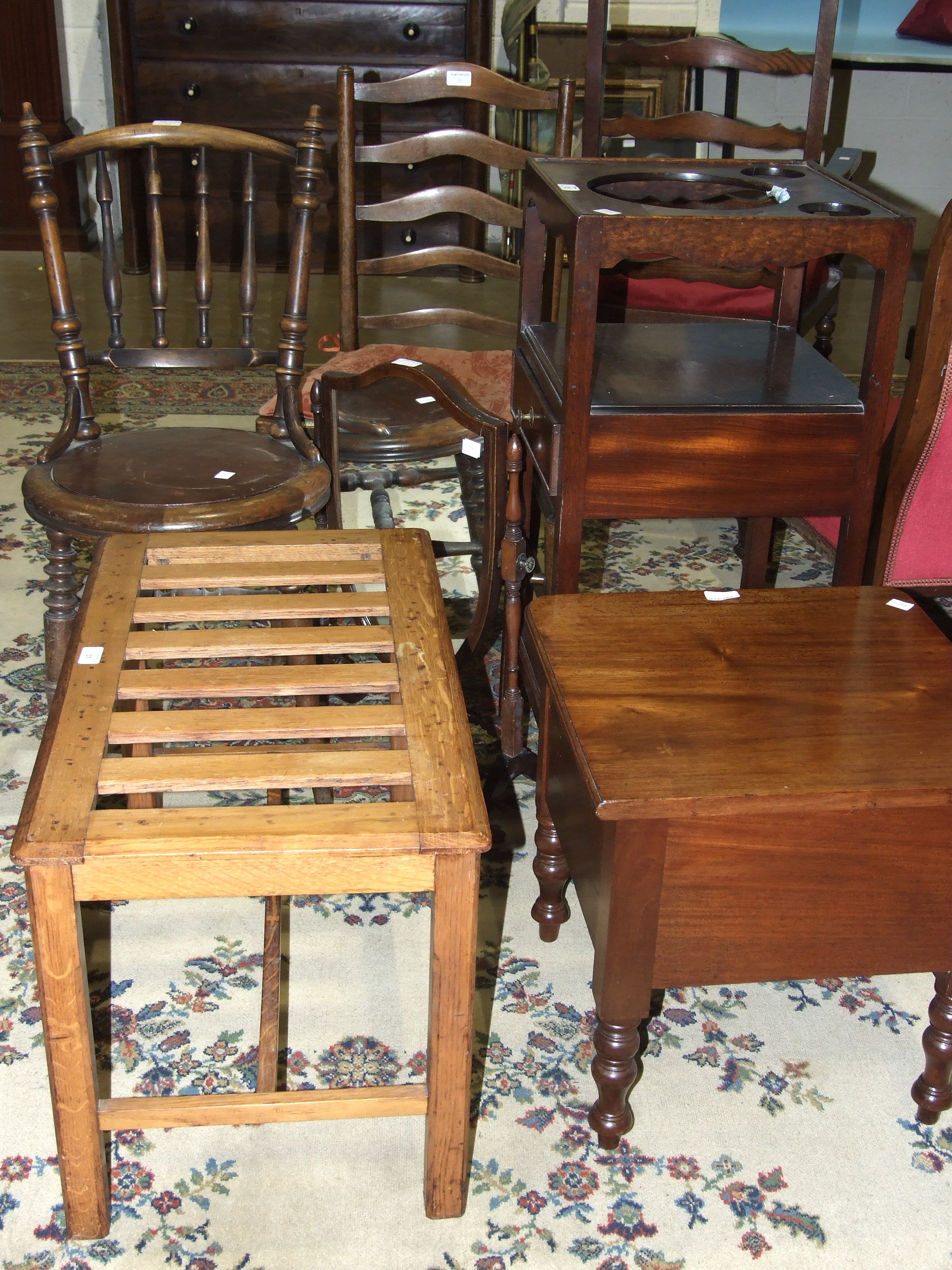 A late-Georgian mahogany wash stand, with pierced upper tier, central drawer and square legs, 38cm