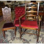 A Victorian walnut low salon chair with button back, on short turned front legs, an oak armchair and