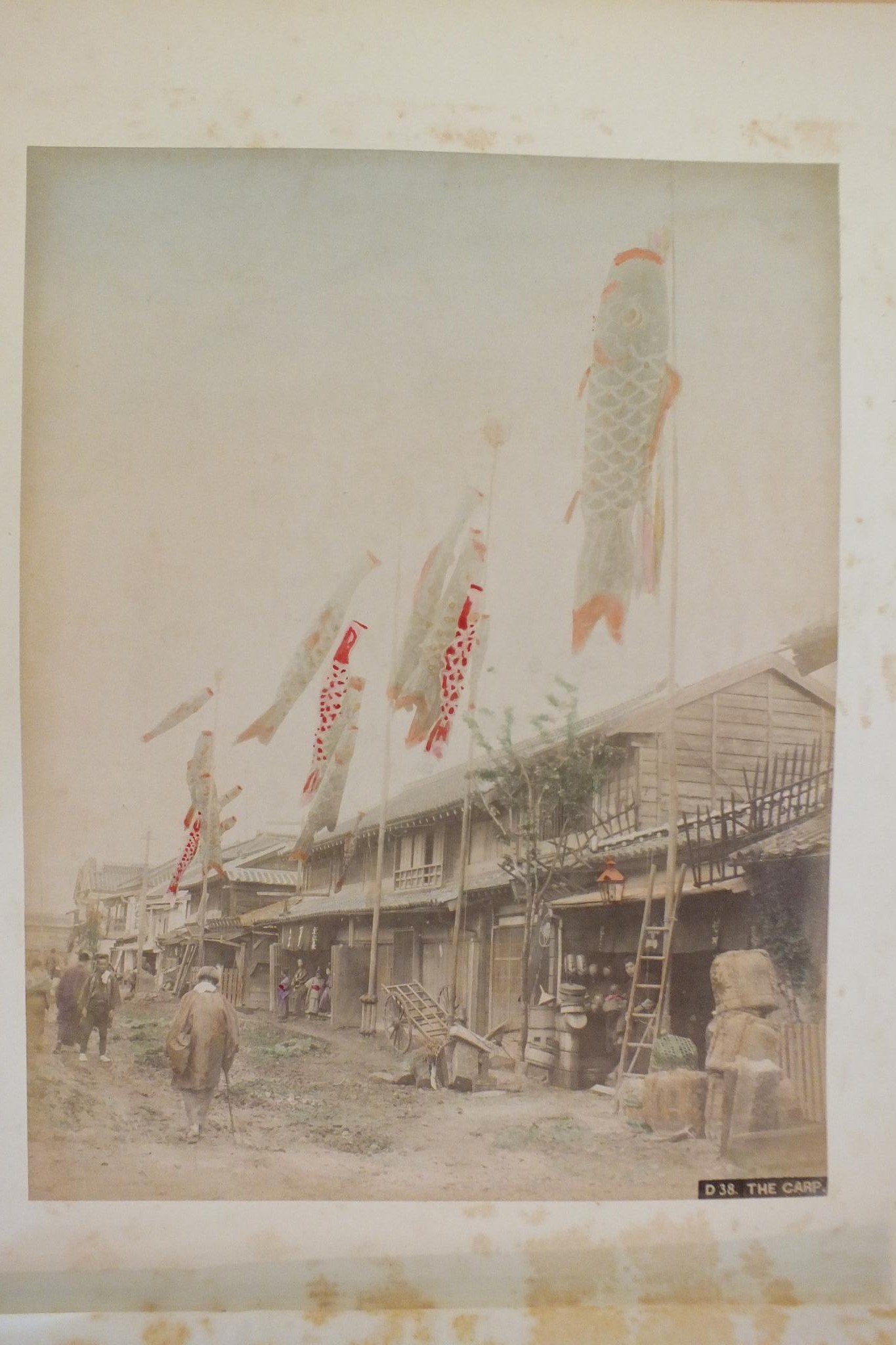 An early-20th century Japanese lacquered shibayama photograph album, containing fifty hand-tinted - Image 21 of 54