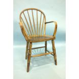 An elm and beech stick-back Yealmpton armchair, (originally painted).
