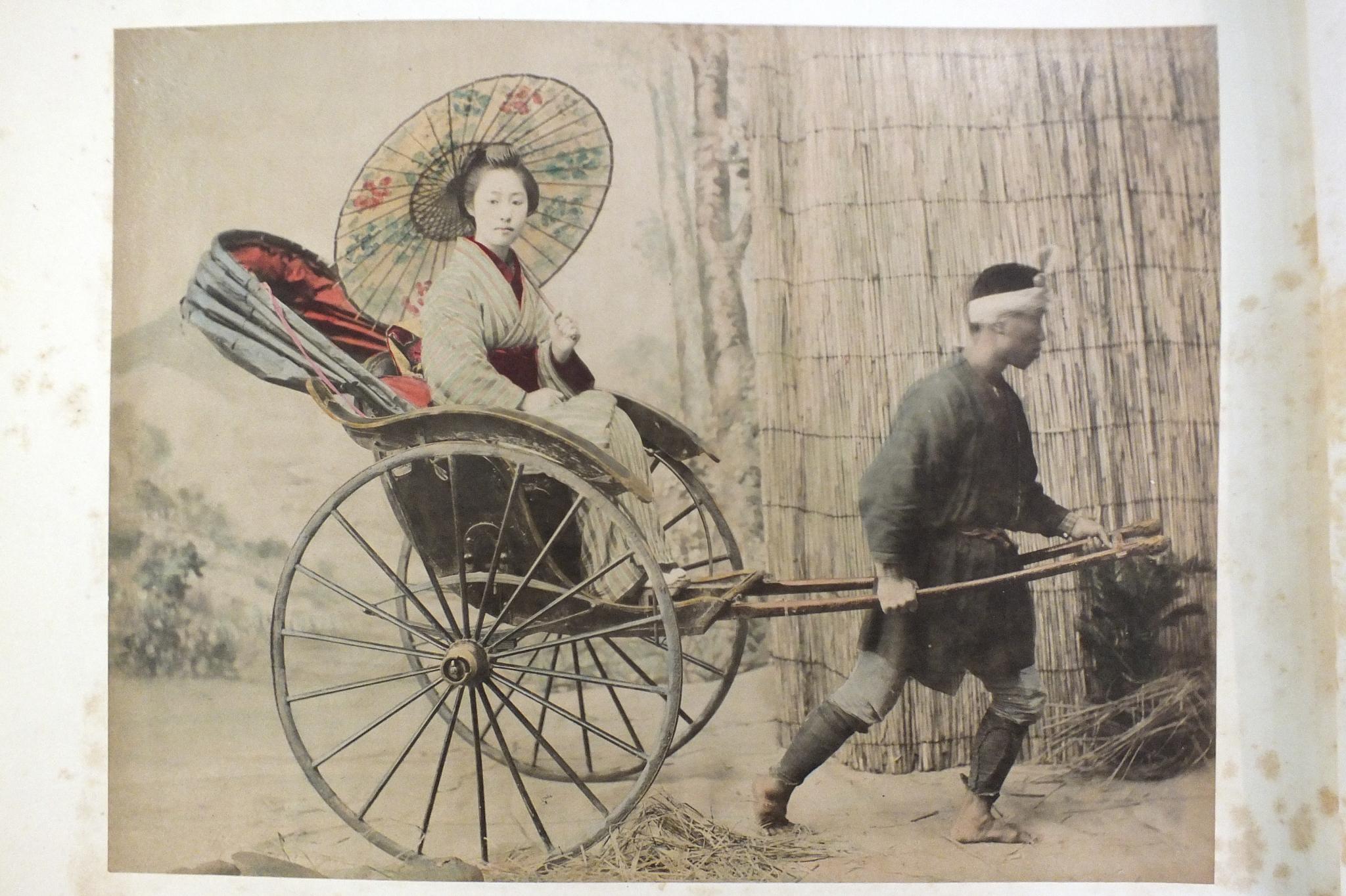 An early-20th century Japanese lacquered shibayama photograph album, containing fifty hand-tinted - Image 18 of 54