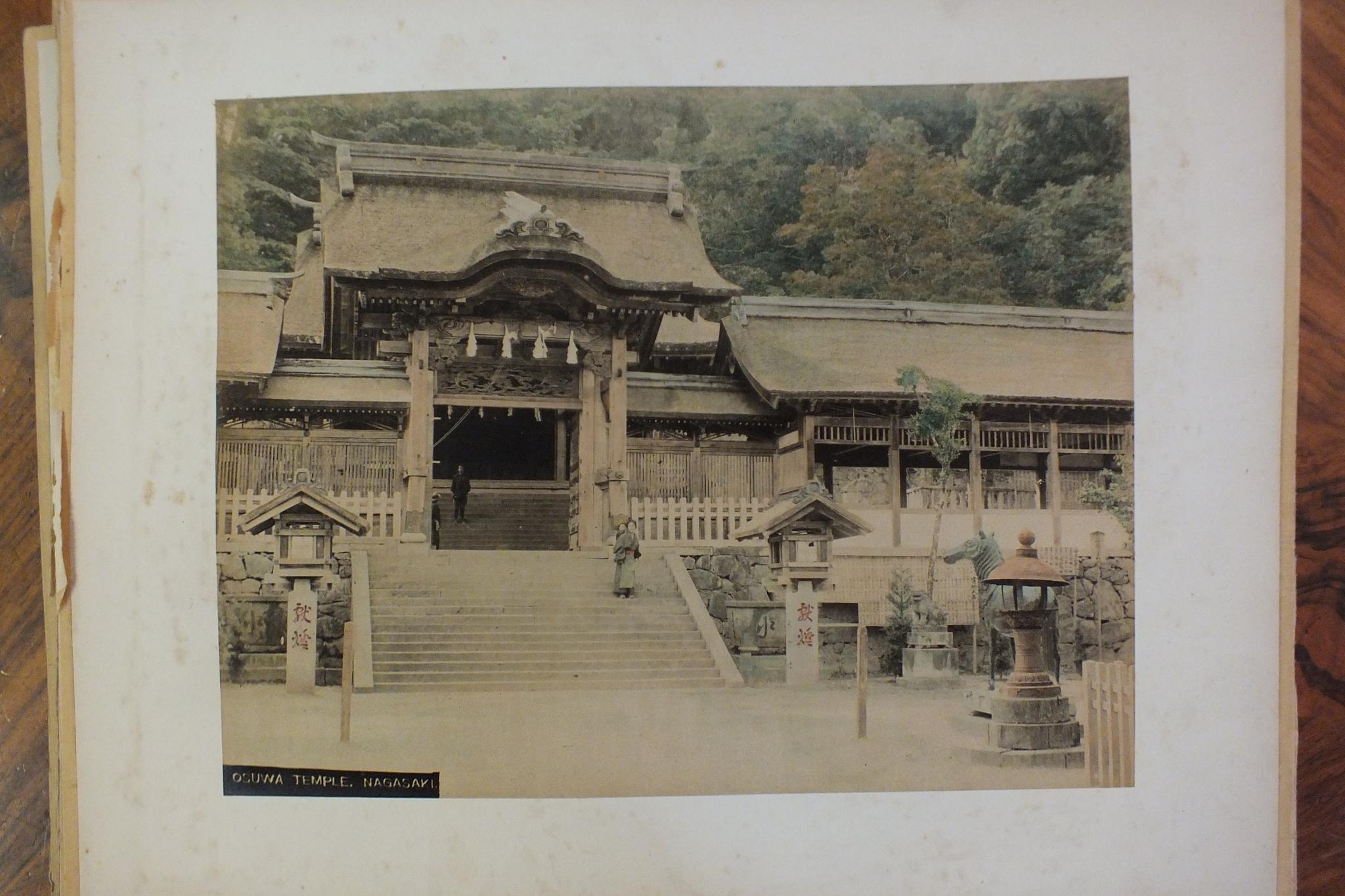 An early-20th century Japanese lacquered shibayama photograph album, containing fifty hand-tinted - Image 49 of 54