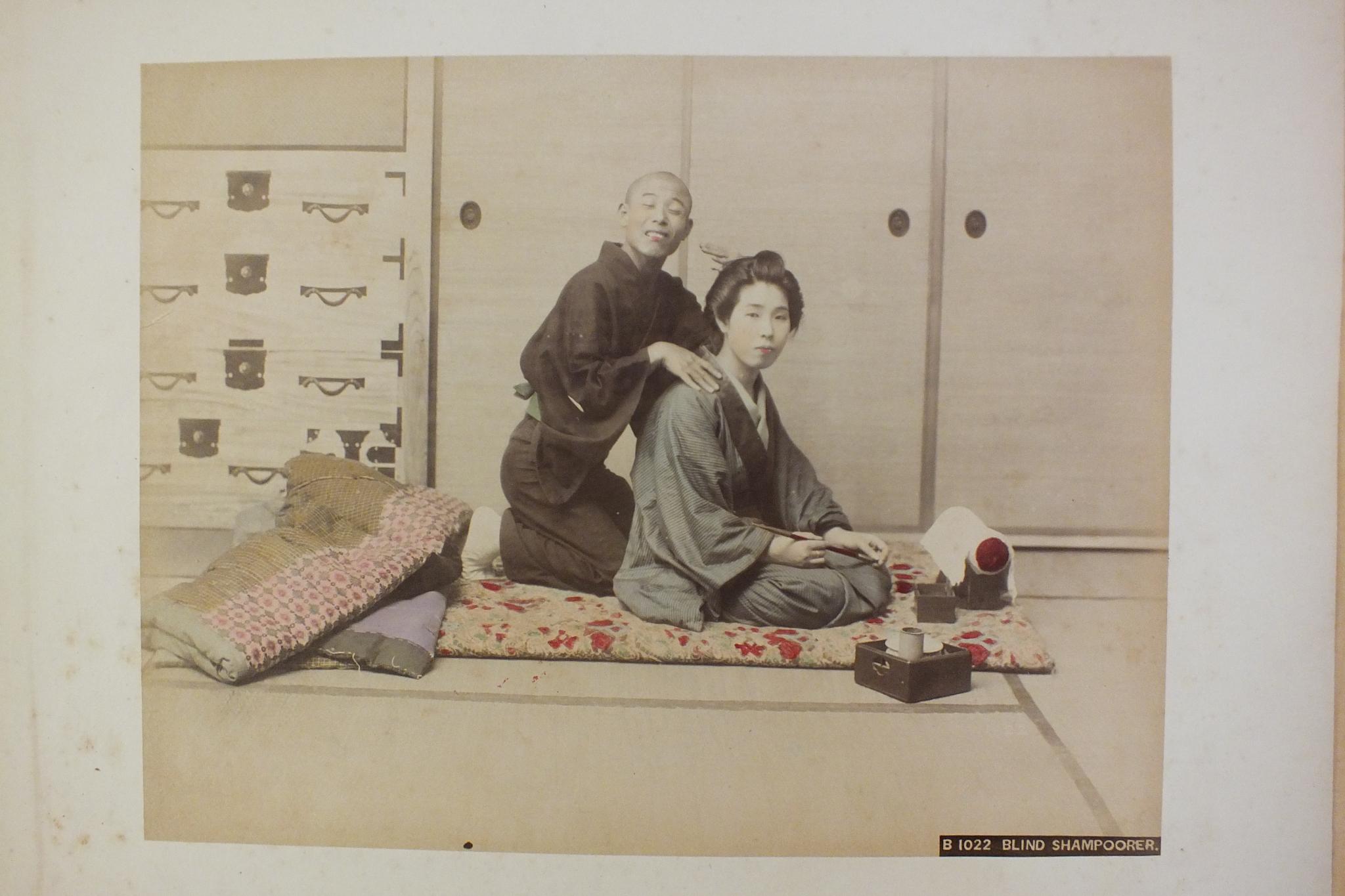 An early-20th century Japanese lacquered shibayama photograph album, containing fifty hand-tinted - Image 54 of 54