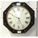 A good-quality early-19th century octagonal mahogany wall clock, the case inlaid with brass, the