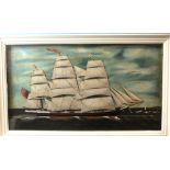 A late-19th century half-block diorama model of a three-masted schooner flying red ensign, the
