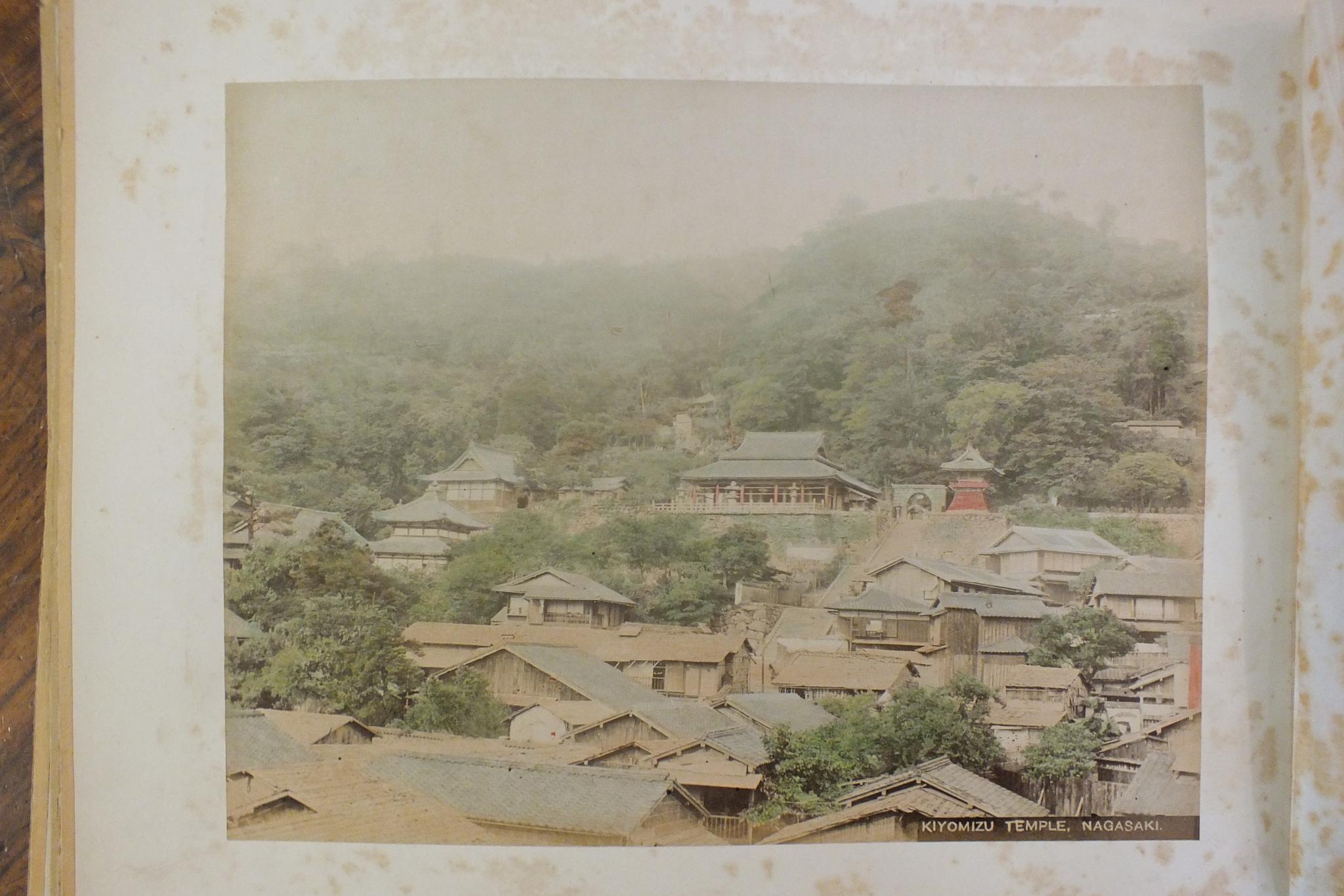 An early-20th century Japanese lacquered shibayama photograph album, containing fifty hand-tinted - Image 26 of 54