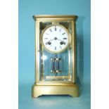 A late-Victorian four-glass gilt brass mantel clock, the bell-striking drum movement with circular