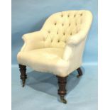 A Victorian mahogany upholstered button-back tub chair on turned front legs with castors.