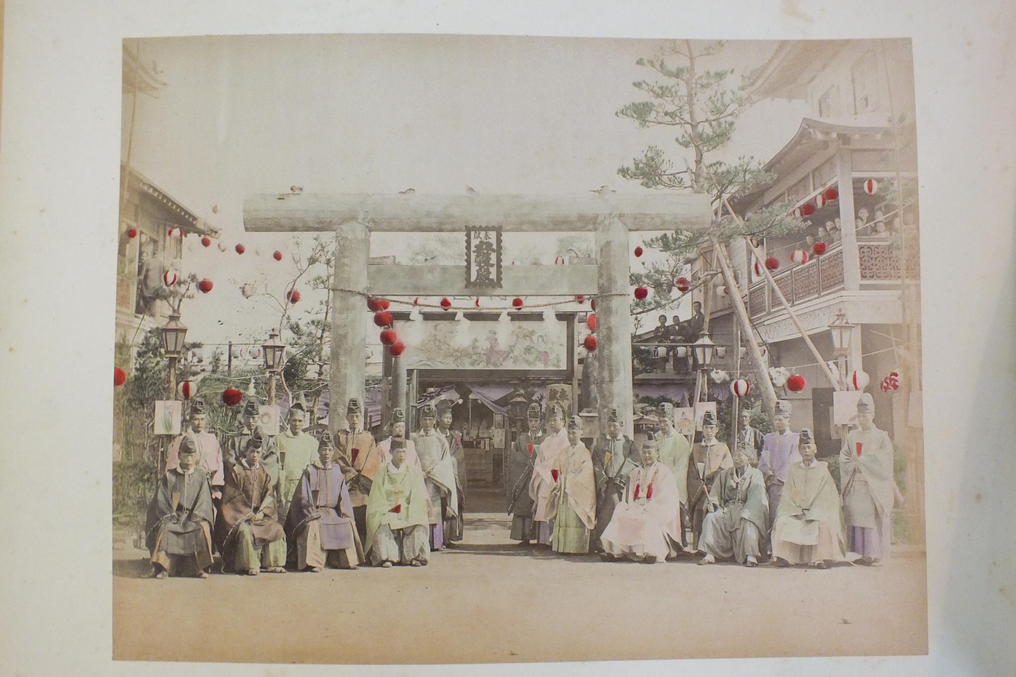 An early-20th century Japanese lacquered shibayama photograph album, containing fifty hand-tinted - Image 34 of 54