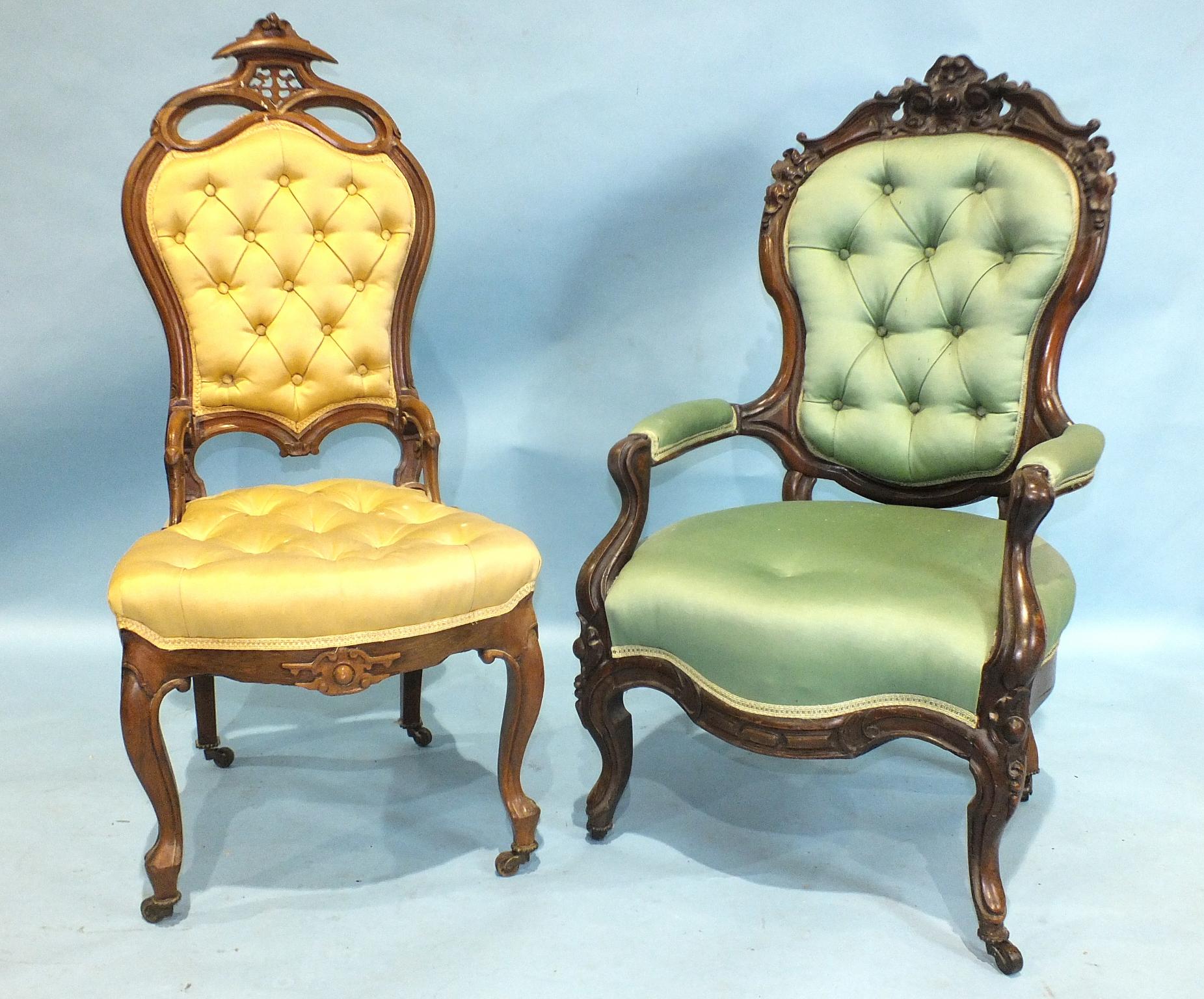 A Victorian rosewood nursing chair with pierced and carved frame, button back and seat and two