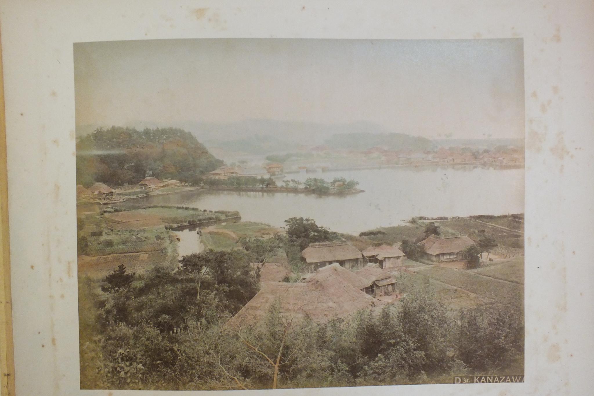 An early-20th century Japanese lacquered shibayama photograph album, containing fifty hand-tinted - Image 39 of 54