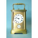 A 19th/20th century French brass alarm-repeater carriage clock, the circular enamel dial and alarm