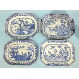 Four 18th century Chinese porcelain octagonal meat dishes decorated with landscapes and garden