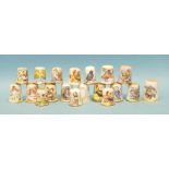 A collection of seventeen Dunheved bone china thimbles painted with various birds, fourteen signed D