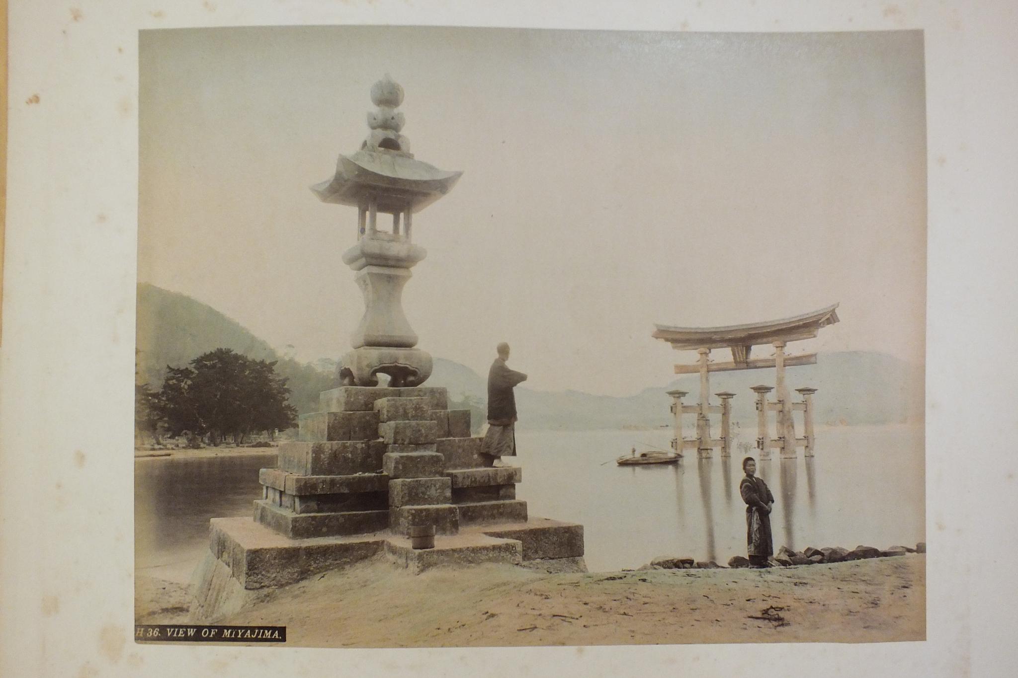 An early-20th century Japanese lacquered shibayama photograph album, containing fifty hand-tinted - Image 33 of 54