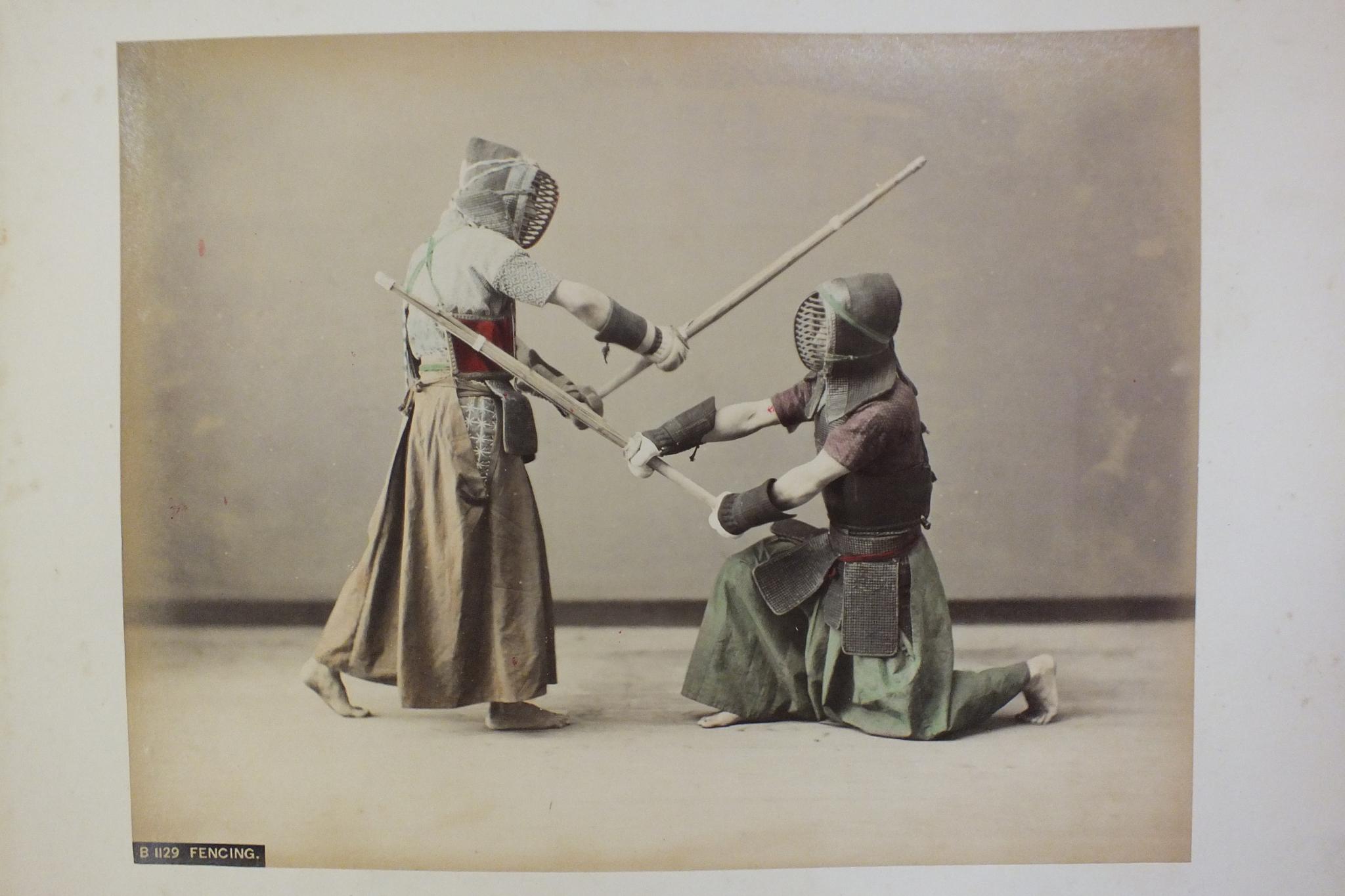 An early-20th century Japanese lacquered shibayama photograph album, containing fifty hand-tinted - Image 38 of 54