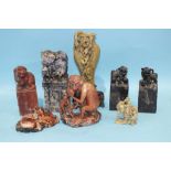 Four Chinese soapstone lion dog seals, a carved 'monkey' group and three other pieces, (damages), (