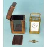 A late-19th/early-20th century brass repeating carriage clock in travelling case, with key, 14cm