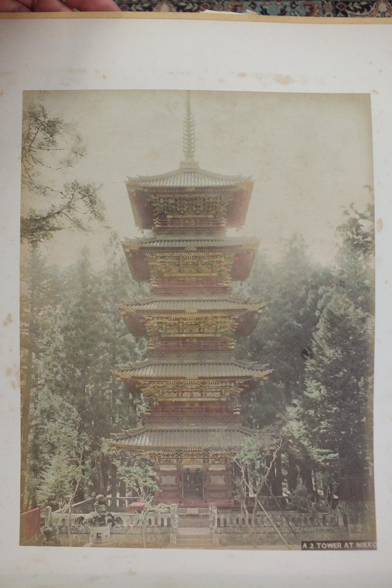 An early-20th century Japanese lacquered shibayama photograph album, containing fifty hand-tinted - Image 13 of 54