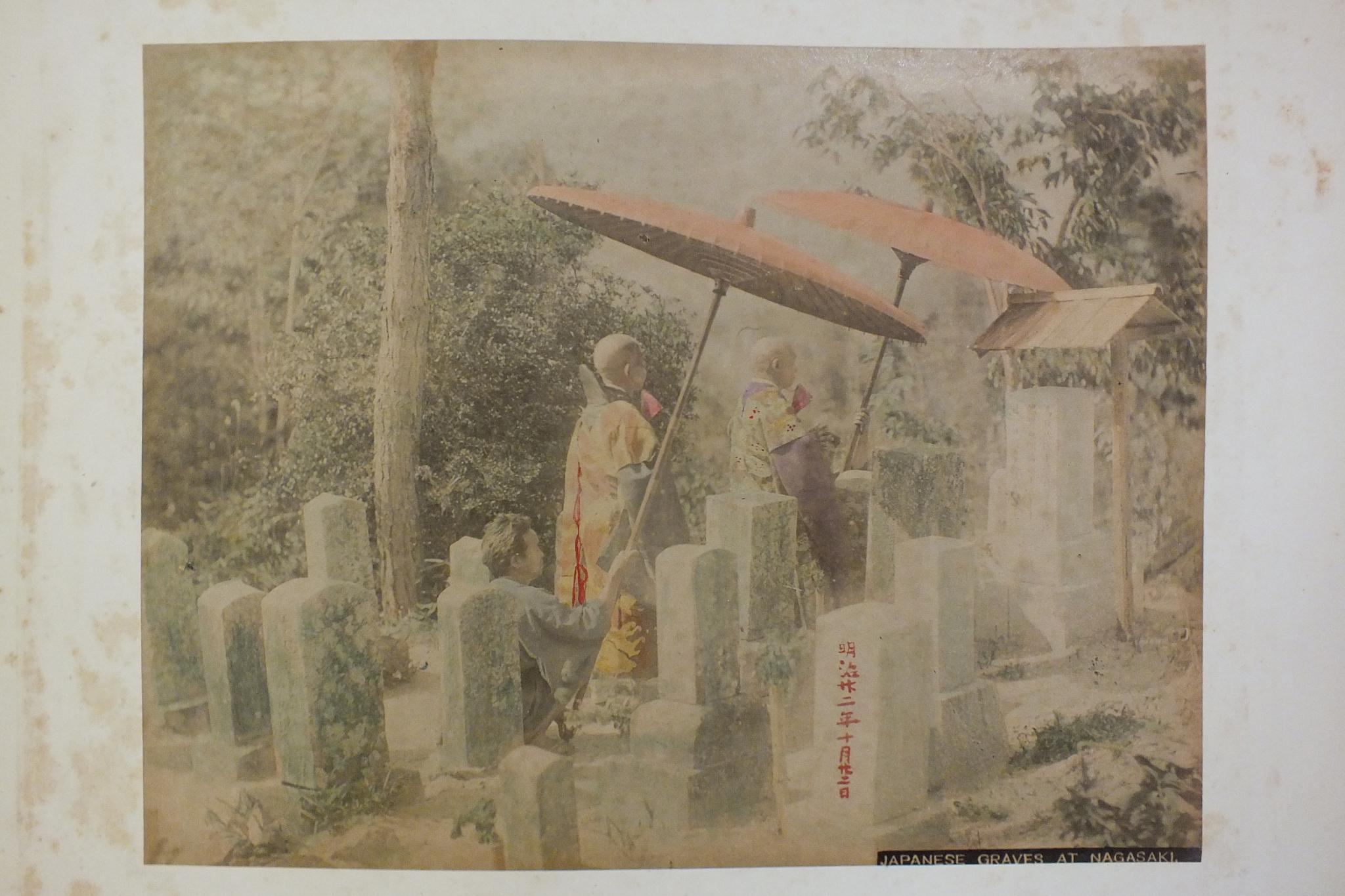 An early-20th century Japanese lacquered shibayama photograph album, containing fifty hand-tinted - Image 37 of 54