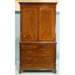 A Georgian mahogany rectangular chest of two short and three long drawers on ogee bracket feet and