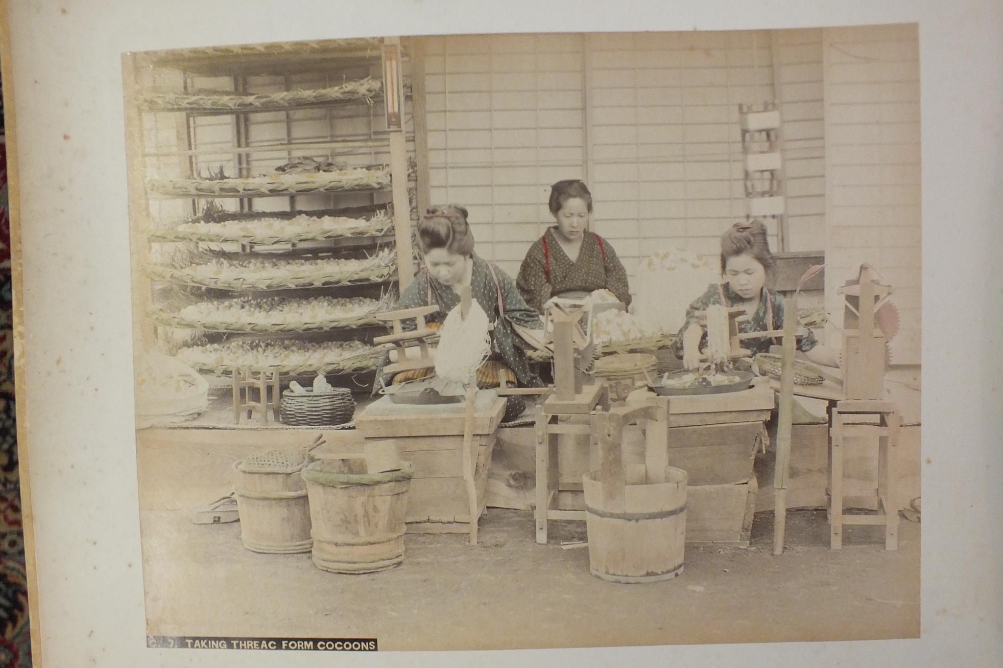 An early-20th century Japanese lacquered shibayama photograph album, containing fifty hand-tinted - Image 44 of 54