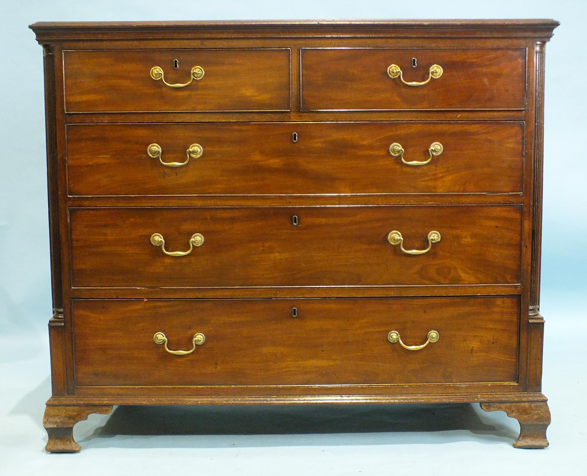 A Georgian mahogany rectangular chest of two short and three long drawers on ogee bracket feet and - Image 2 of 2