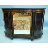 A Victorian ebonised and gilt metal-mounted side cabinet, having a central mirror door and two bowed