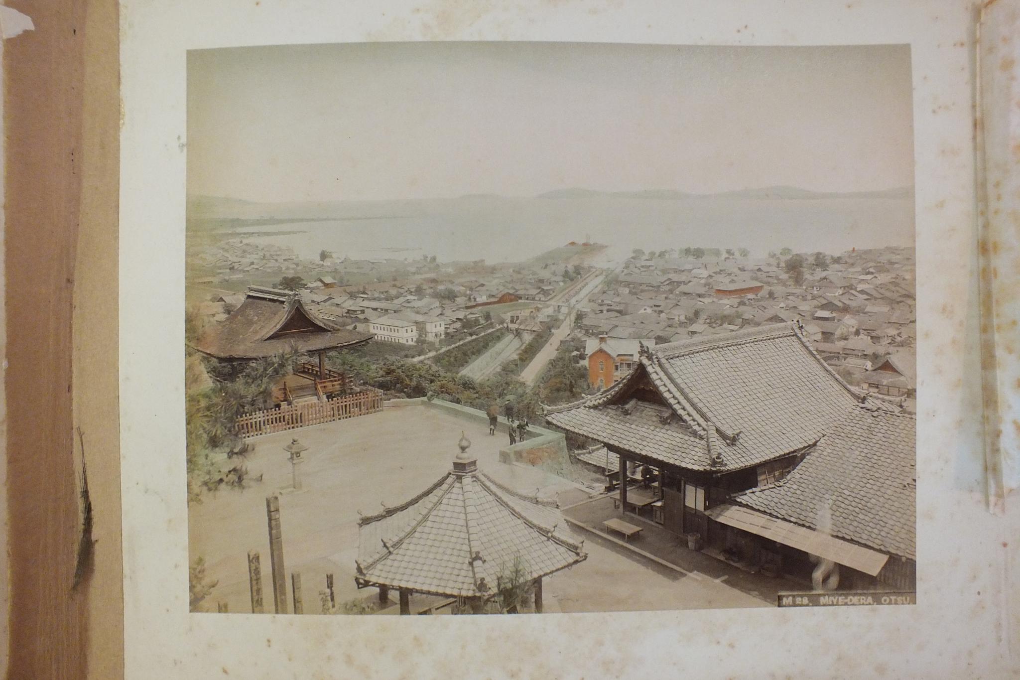 An early-20th century Japanese lacquered shibayama photograph album, containing fifty hand-tinted - Image 51 of 54