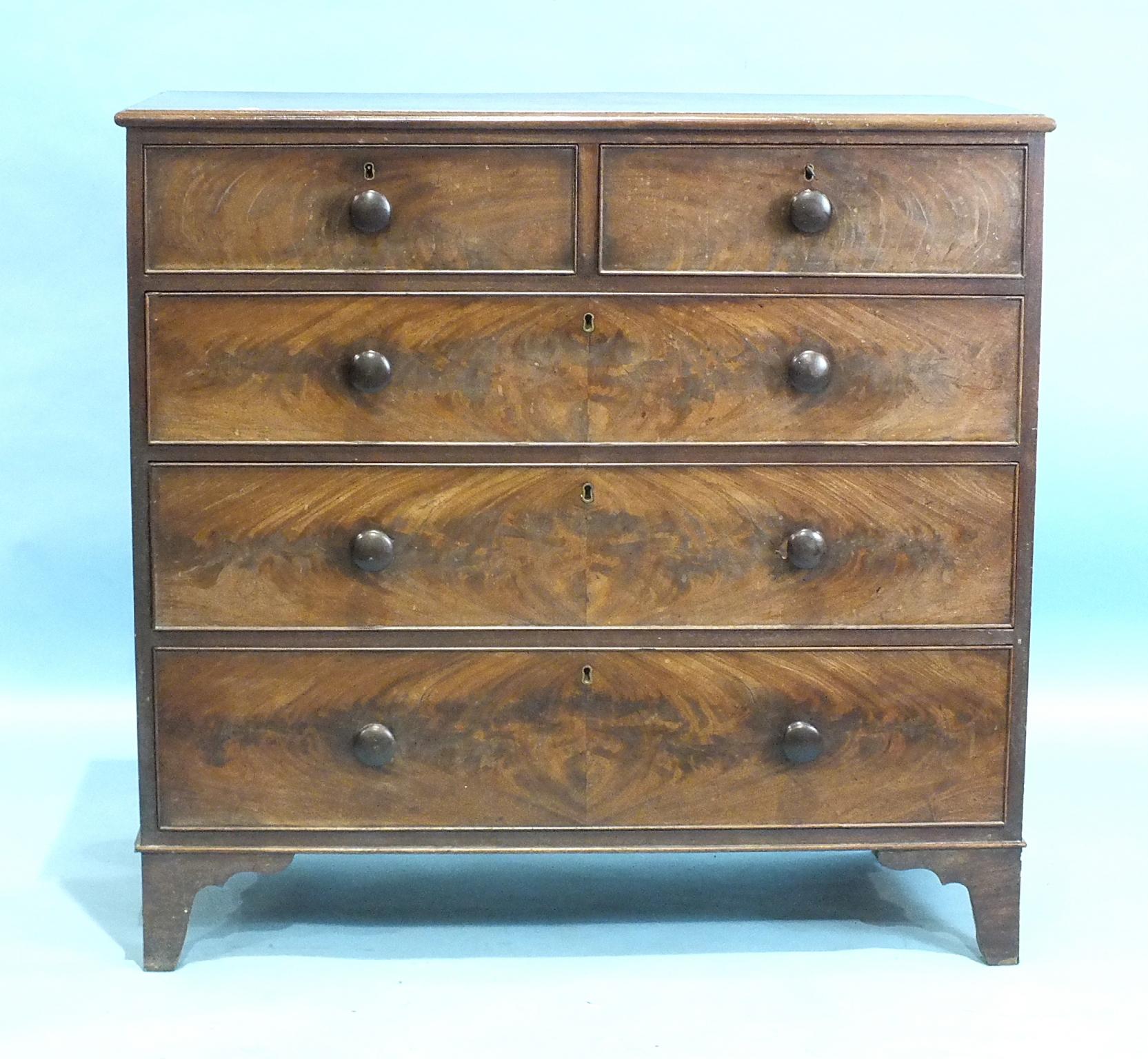 A late-George-III mahogany chest of two short and three cockbeaded drawers, on bracket feet, 109cm