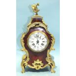 A 19th century French tortoiseshell and gilt metal mantel clock, with enamel dial and gong-