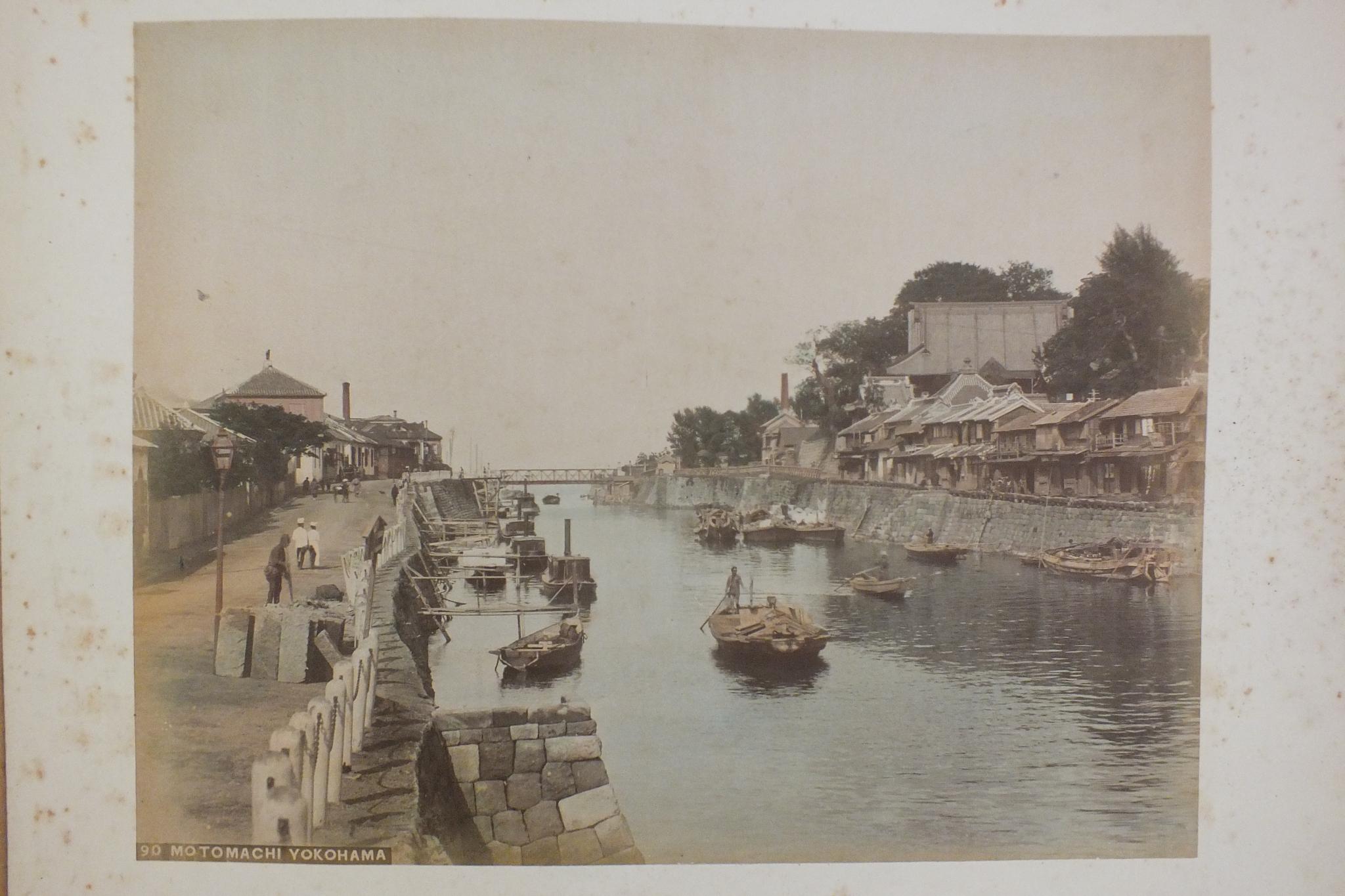 An early-20th century Japanese lacquered shibayama photograph album, containing fifty hand-tinted - Image 43 of 54