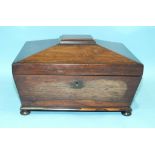 A Victorian rosewood work box of sarcophagus form, the interior fitment in need of restoration, 28 x
