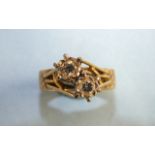 An 18ct yellow gold cross-over ring illusion-set two brilliant-cut diamonds, size P, 6.9g.