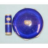 An engine-turned silver and enamel round compact with blue guilloche enamel and naval crown,